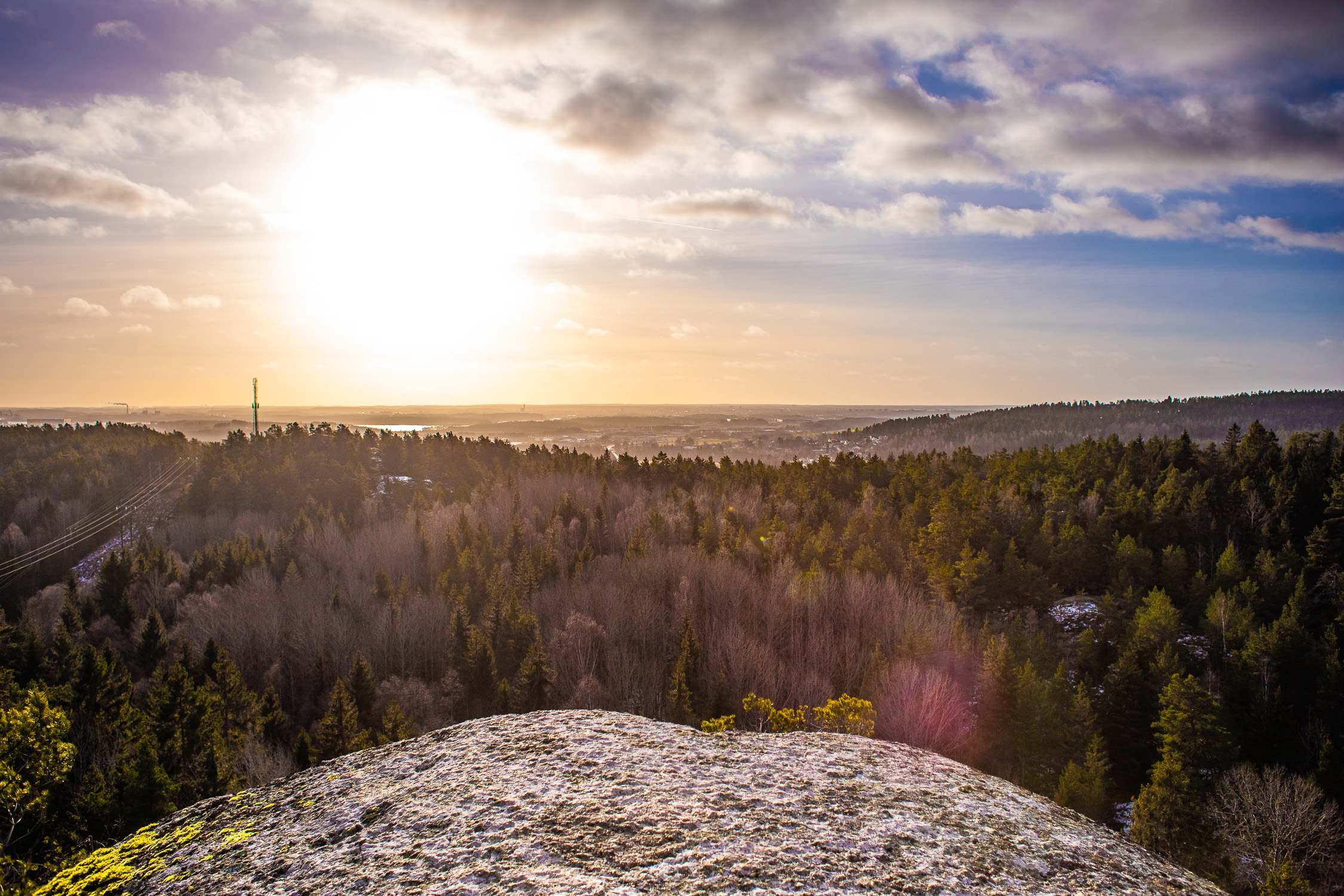 Utsikt mot solen över Åby och Norrköping