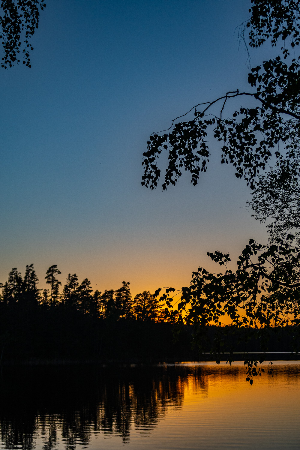 Solnedgång över sjön Björken längs Nynäsrundan